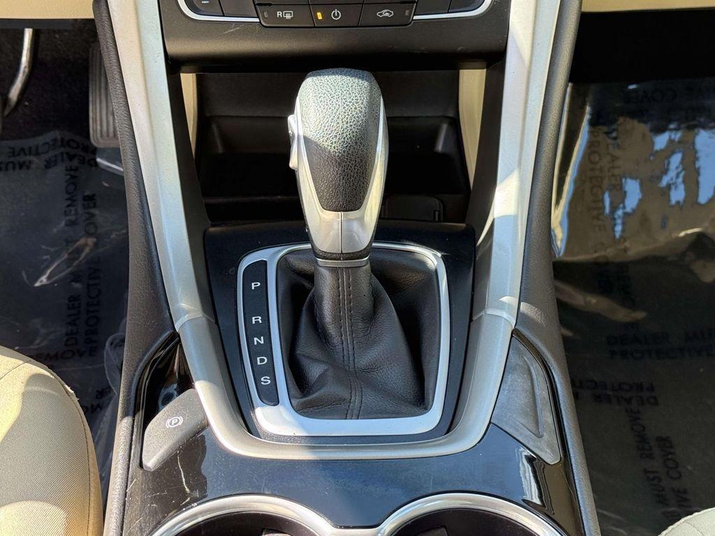 used 2016 Ford Fusion car, priced at $10,000