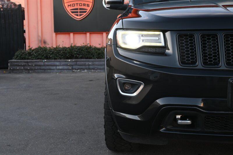 used 2014 Jeep Grand Cherokee car, priced at $10,497