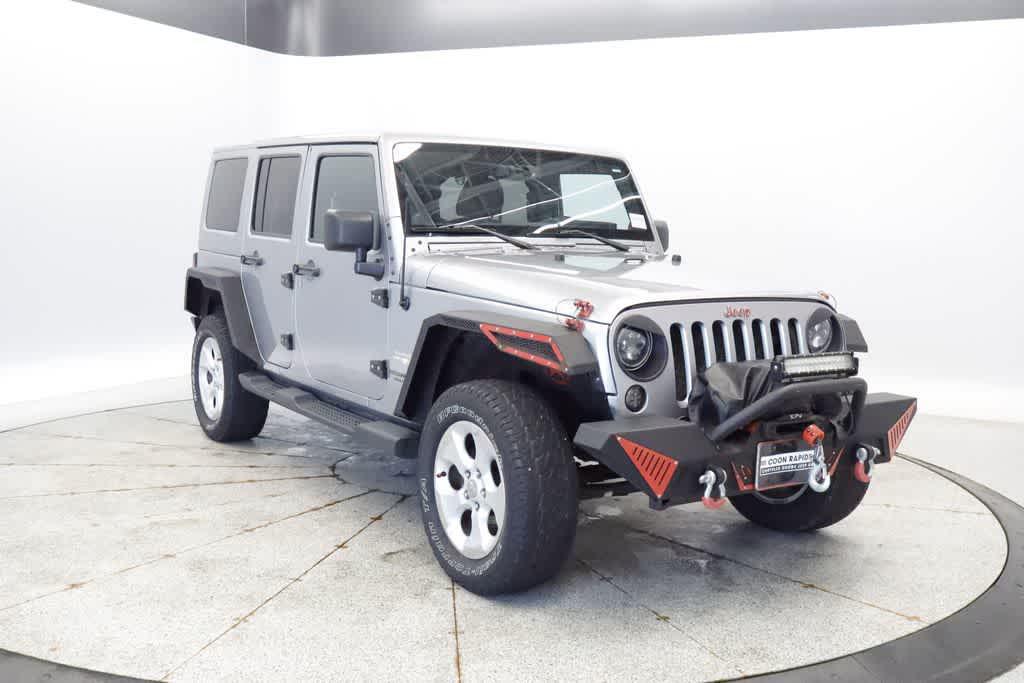 used 2013 Jeep Wrangler Unlimited car, priced at $15,297
