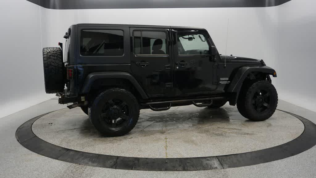 used 2014 Jeep Wrangler Unlimited car, priced at $13,804