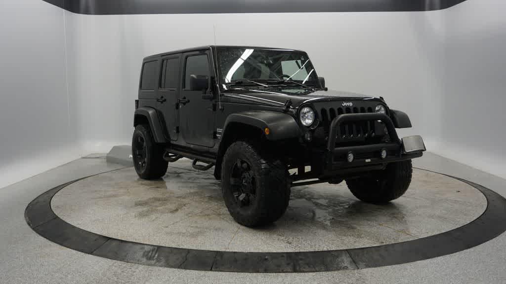 used 2014 Jeep Wrangler Unlimited car, priced at $13,804