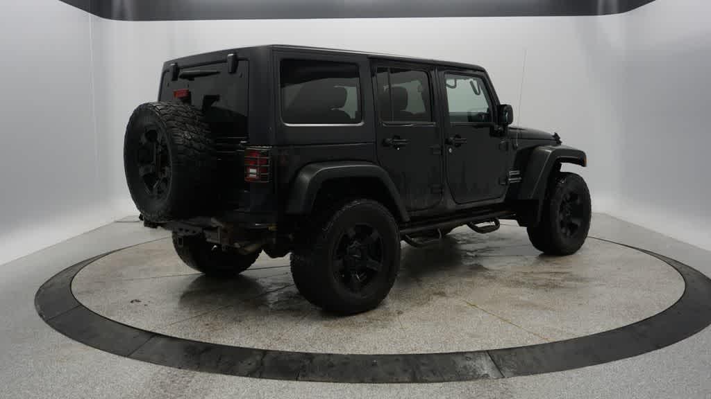 used 2014 Jeep Wrangler Unlimited car, priced at $13,804