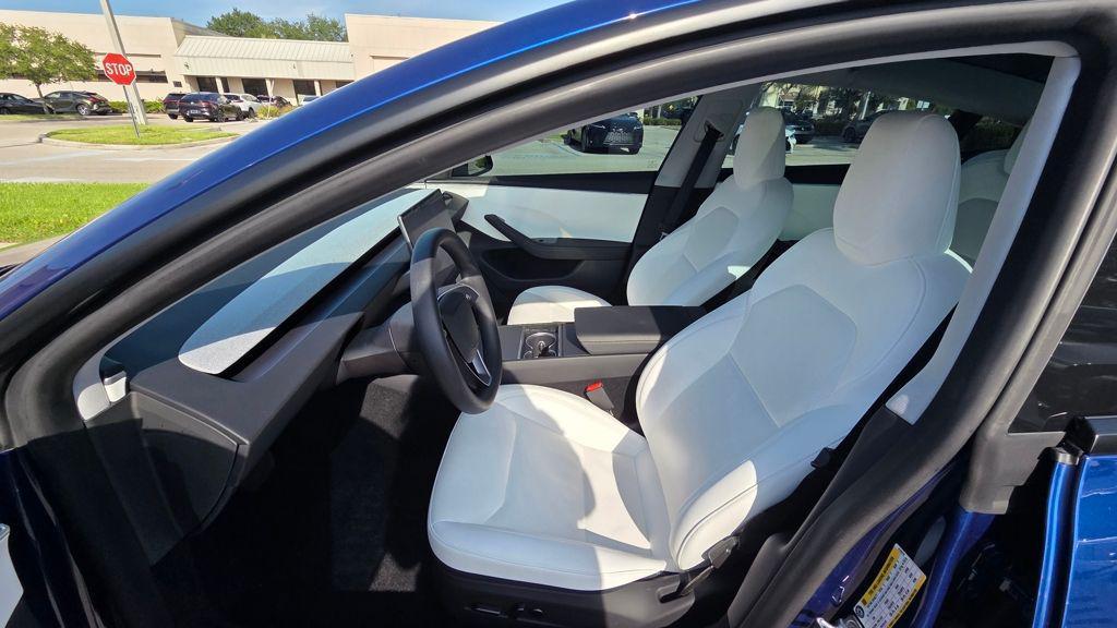 used 2025 Tesla Model 3 car, priced at $37,998