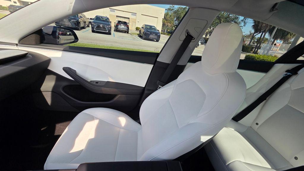 used 2025 Tesla Model 3 car, priced at $37,998