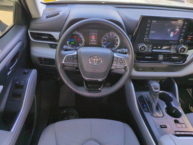 used 2021 Toyota Highlander Hybrid car, priced at $29,988