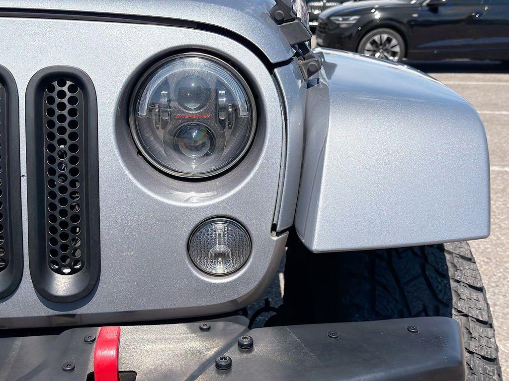 used 2016 Jeep Wrangler Unlimited car, priced at $18,322