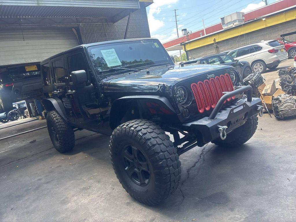 used 2013 Jeep Wrangler Unlimited car, priced at $13,995