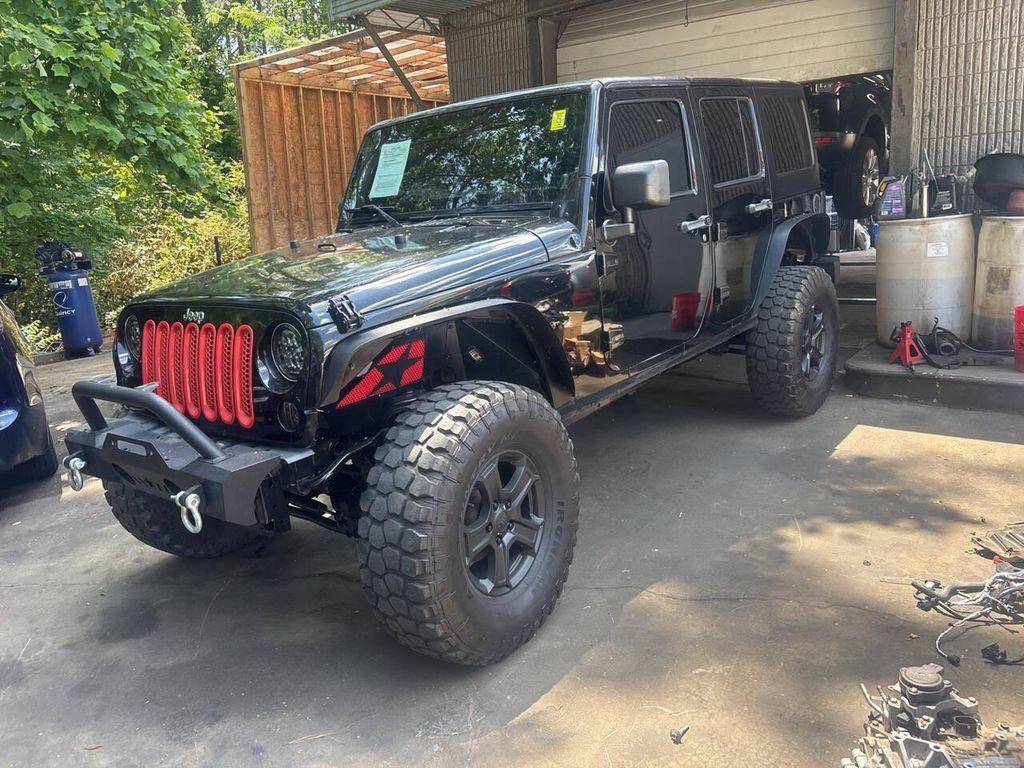 used 2013 Jeep Wrangler Unlimited car, priced at $13,995