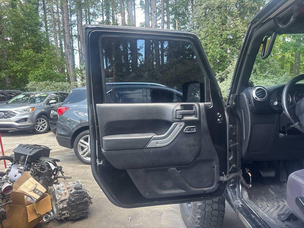 used 2013 Jeep Wrangler Unlimited car, priced at $13,995