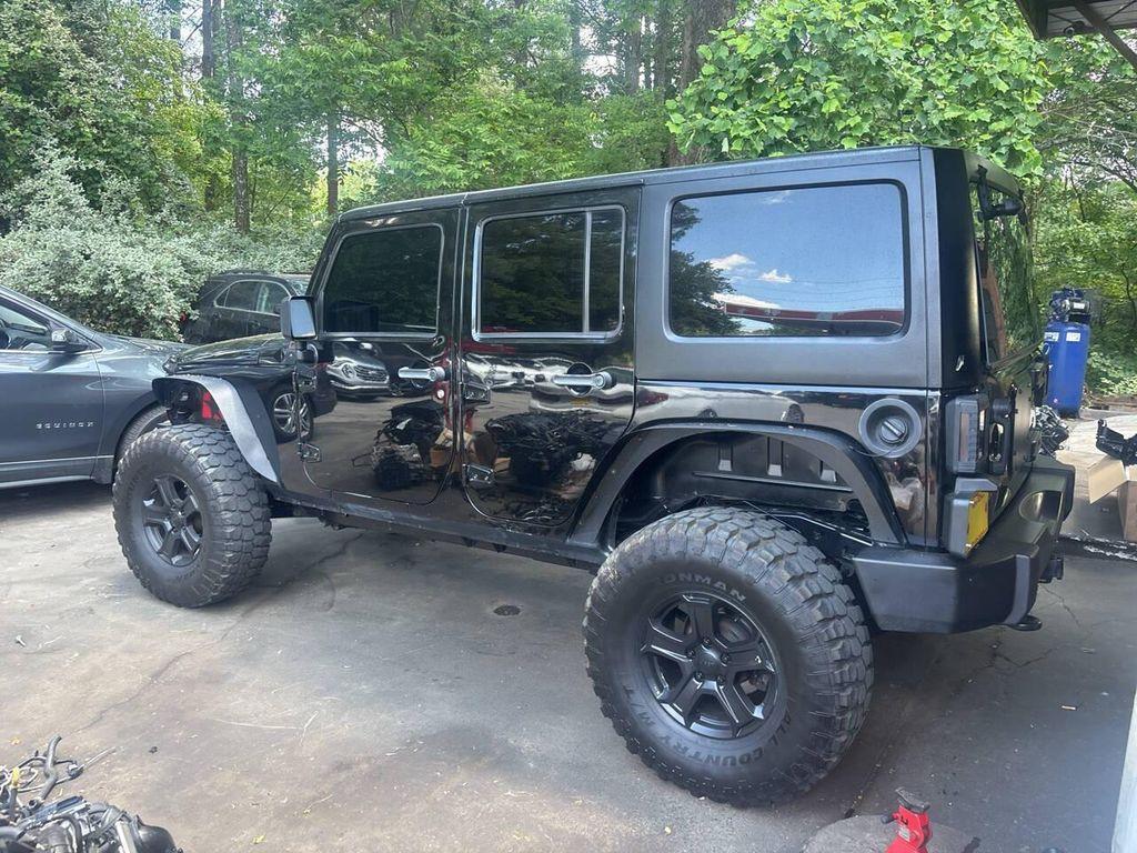 used 2013 Jeep Wrangler Unlimited car, priced at $13,995