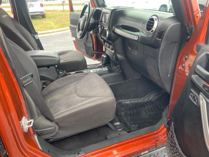 used 2014 Jeep Wrangler Unlimited car, priced at $13,980