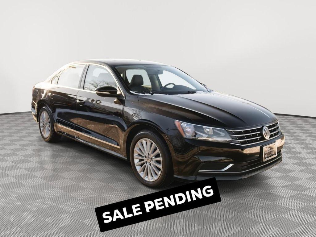 used 2016 Volkswagen Passat car, priced at $12,000