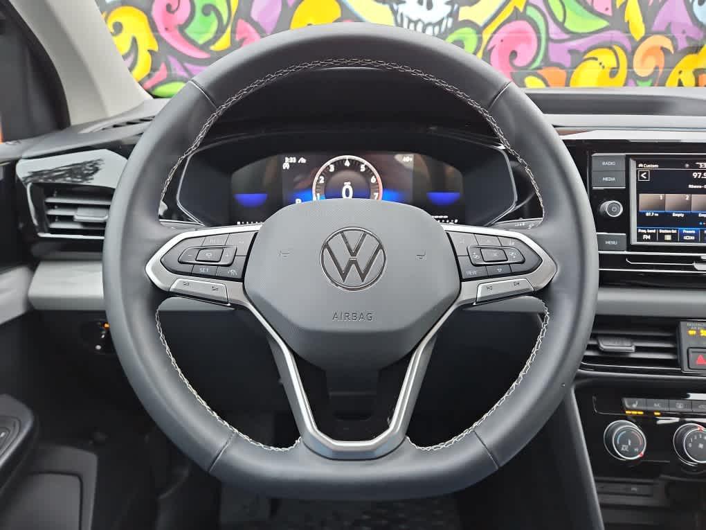 used 2024 Volkswagen Taos car, priced at $20,917