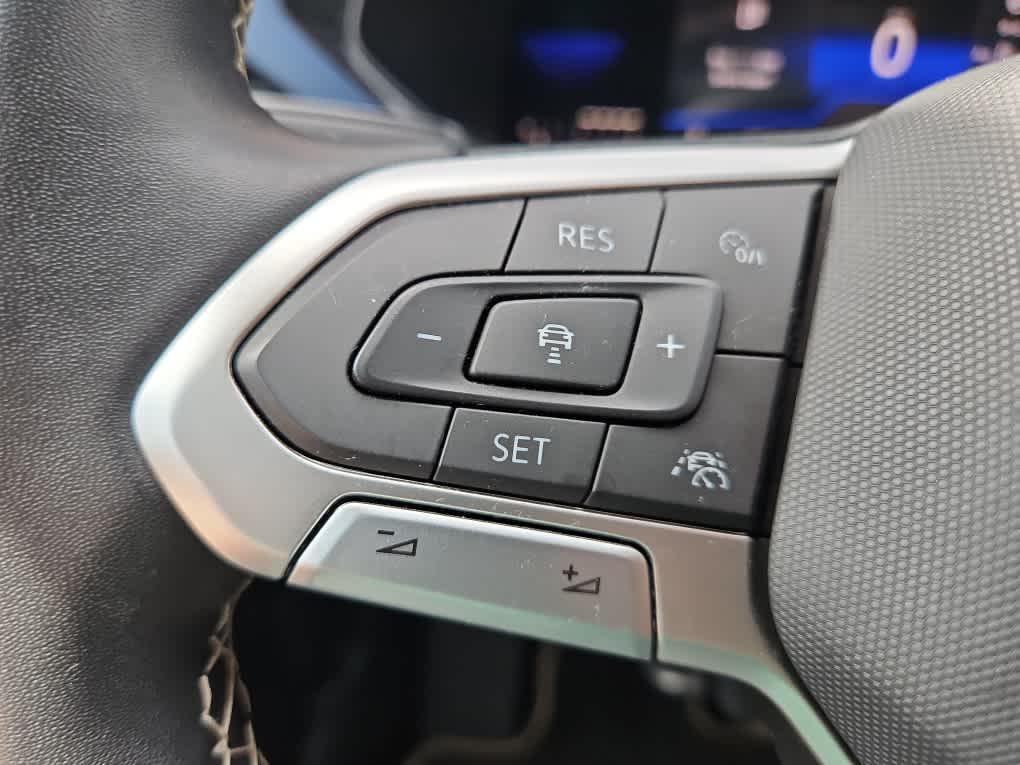 used 2023 Volkswagen Taos car, priced at $23,490