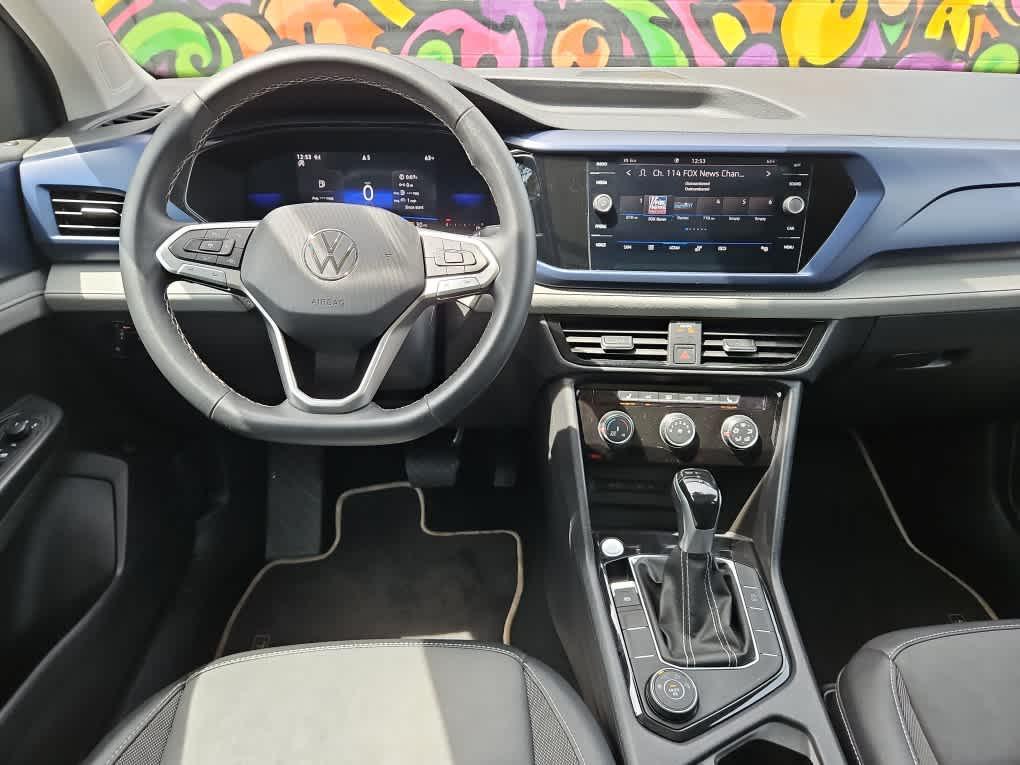 used 2023 Volkswagen Taos car, priced at $23,490