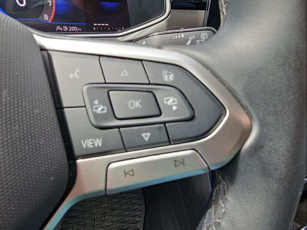 used 2025 Volkswagen Taos car, priced at $26,707
