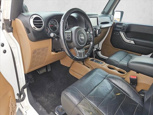 used 2012 Jeep Wrangler Unlimited car, priced at $12,495