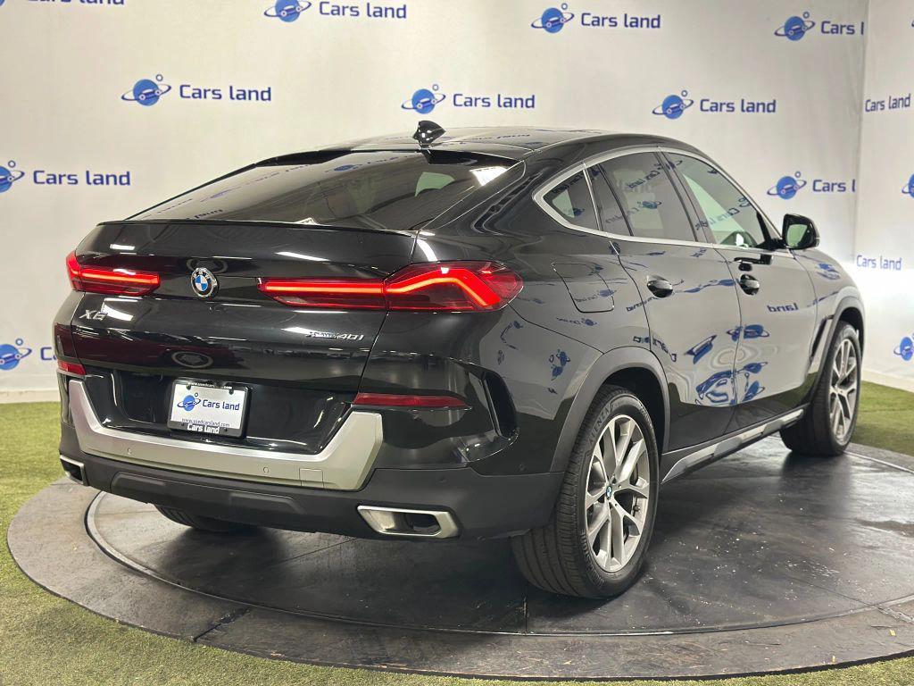 used 2023 BMW X6 car, priced at $49,311