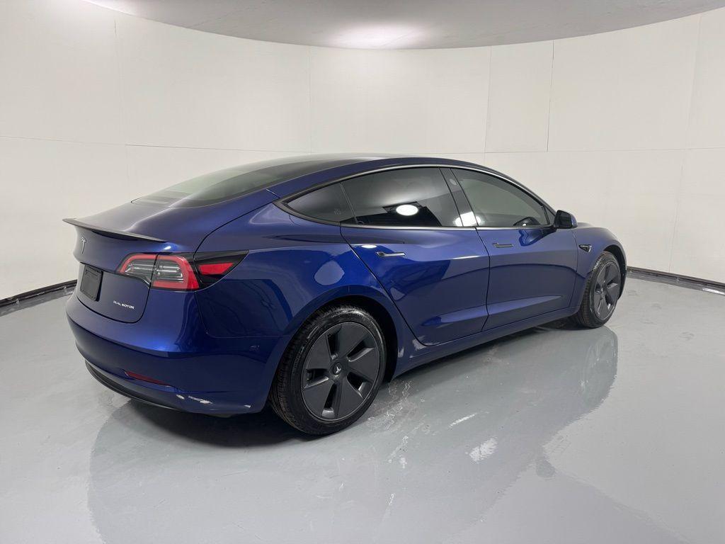 used 2023 Tesla Model 3 car, priced at $27,638