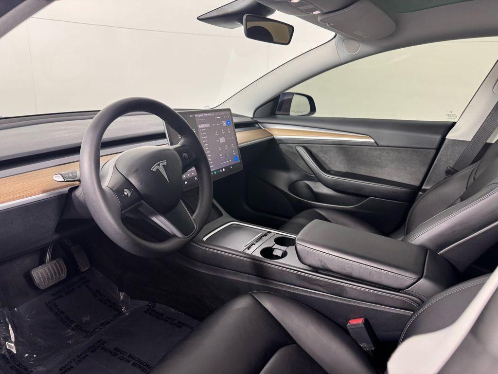 used 2023 Tesla Model 3 car, priced at $27,638