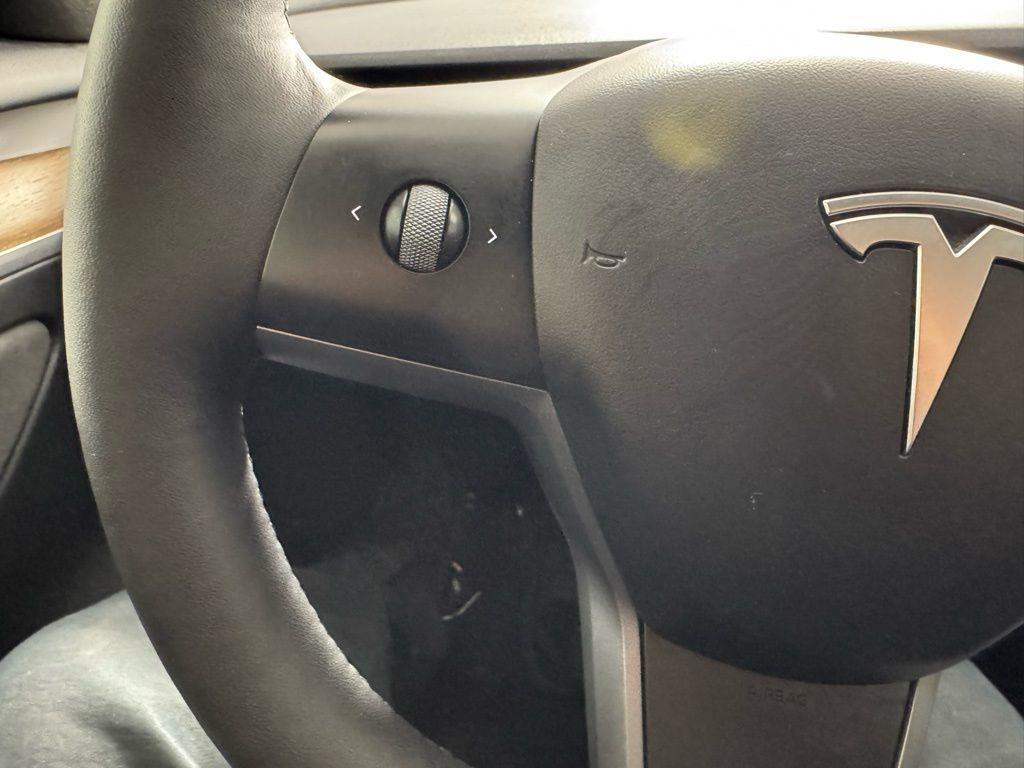 used 2023 Tesla Model 3 car, priced at $27,638