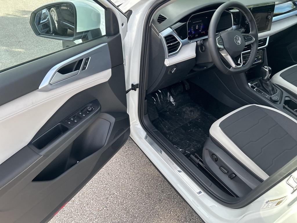 new 2025 Volkswagen Taos car, priced at $24,743