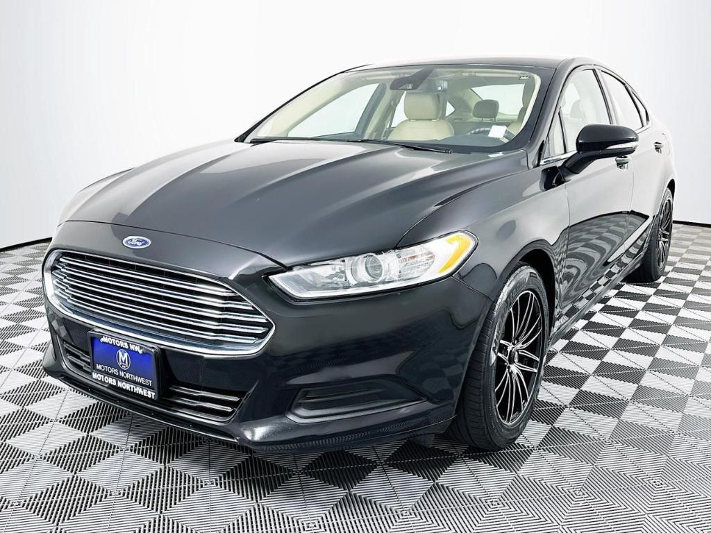 used 2016 Ford Fusion car, priced at $7,000