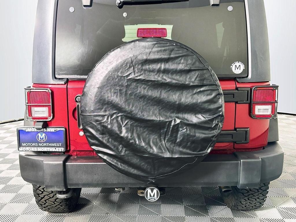 used 2011 Jeep Wrangler Unlimited car, priced at $13,995