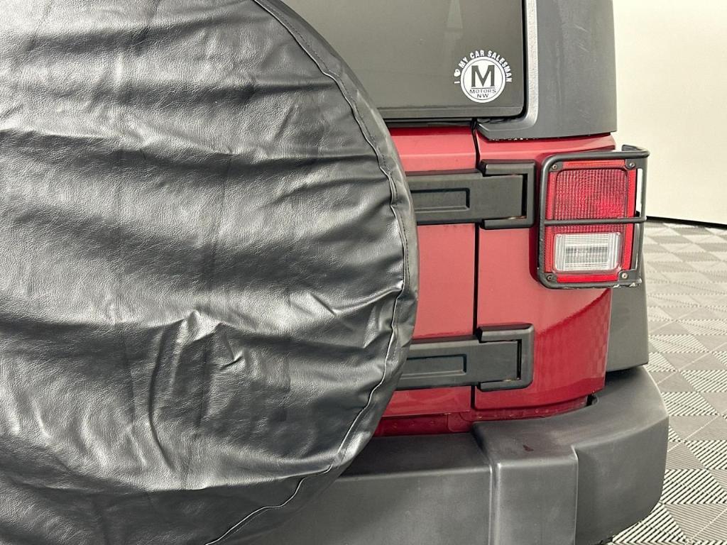 used 2011 Jeep Wrangler Unlimited car, priced at $13,995