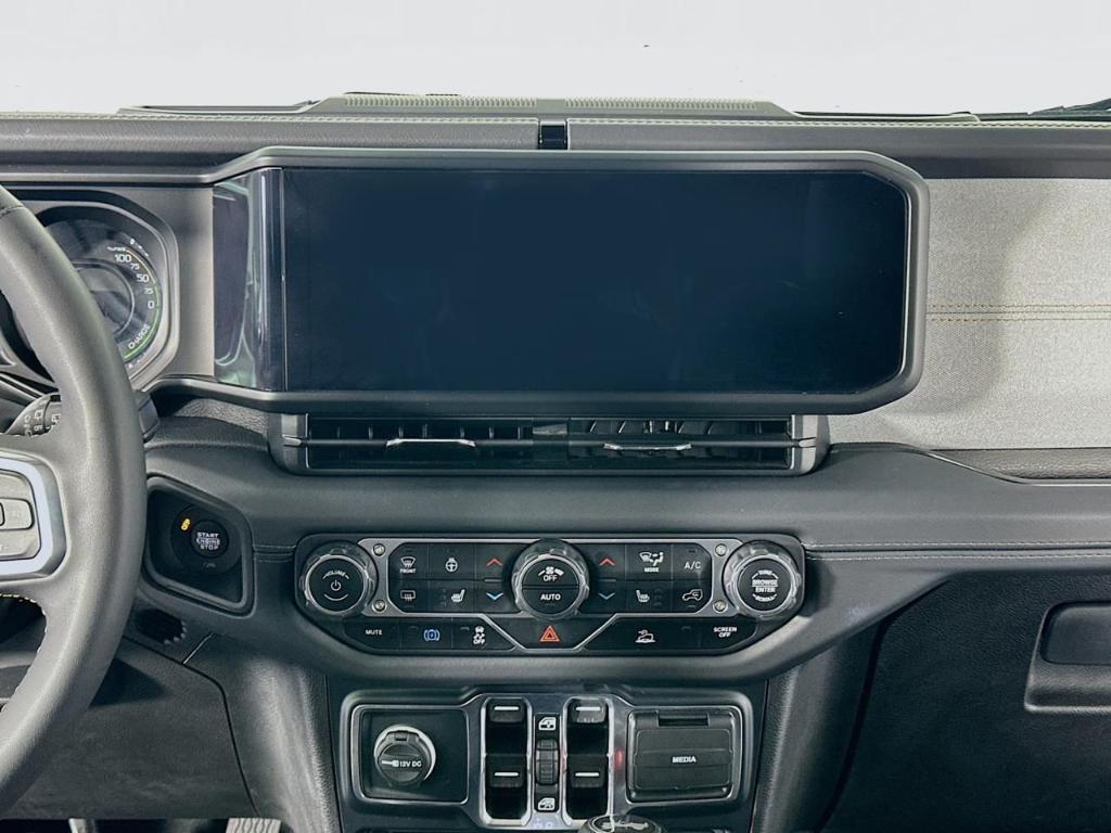 used 2024 Jeep Wrangler 4xe car, priced at $27,995