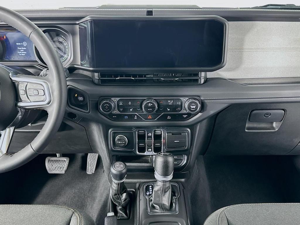 used 2024 Jeep Wrangler 4xe car, priced at $27,995