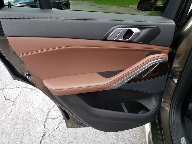 used 2023 BMW X6 car, priced at $56,995