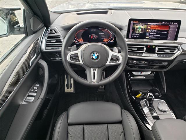 used 2024 BMW X4 car, priced at $56,995