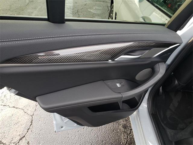 used 2024 BMW X4 car, priced at $56,995