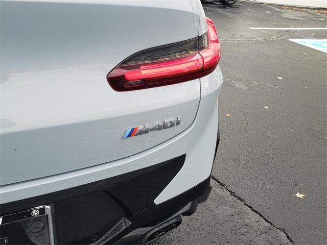 used 2024 BMW X4 car, priced at $56,995