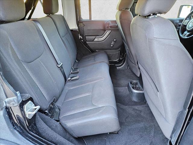 used 2015 Jeep Wrangler Unlimited car, priced at $19,921