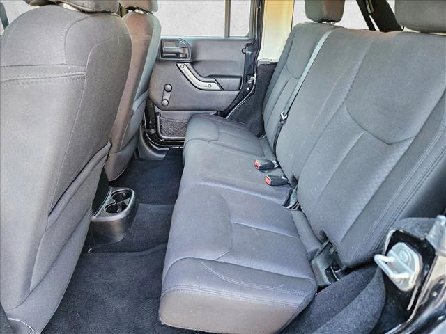 used 2015 Jeep Wrangler Unlimited car, priced at $19,921