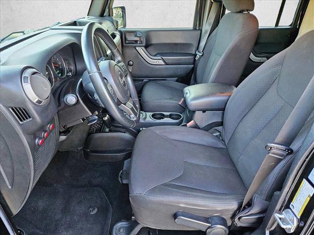 used 2015 Jeep Wrangler Unlimited car, priced at $19,921