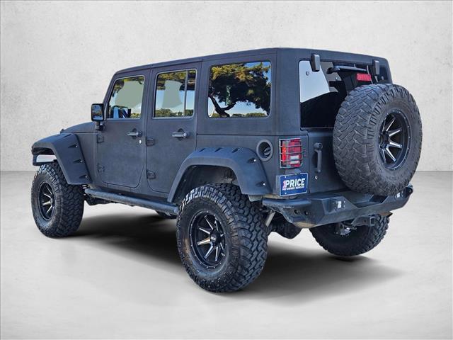 used 2015 Jeep Wrangler Unlimited car, priced at $19,921