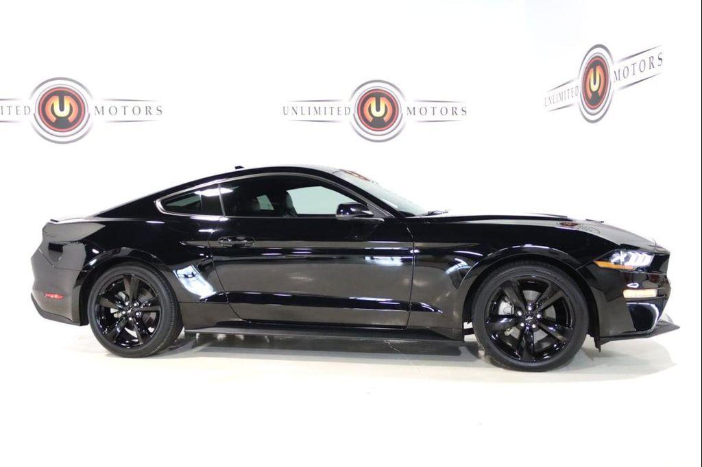 used 2021 Ford Mustang car, priced at $27,900