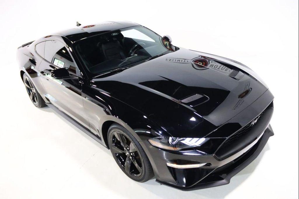 used 2021 Ford Mustang car, priced at $27,900