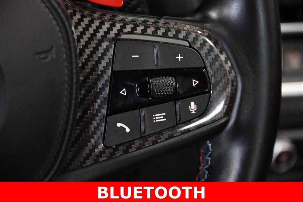 used 2023 BMW M4 car, priced at $71,900