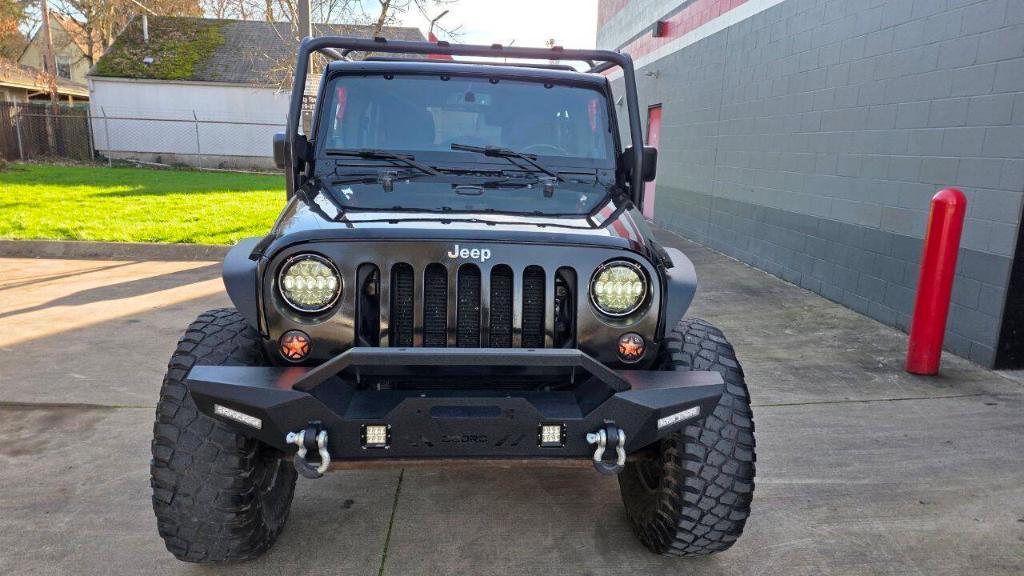 used 2014 Jeep Wrangler Unlimited car, priced at $16,495