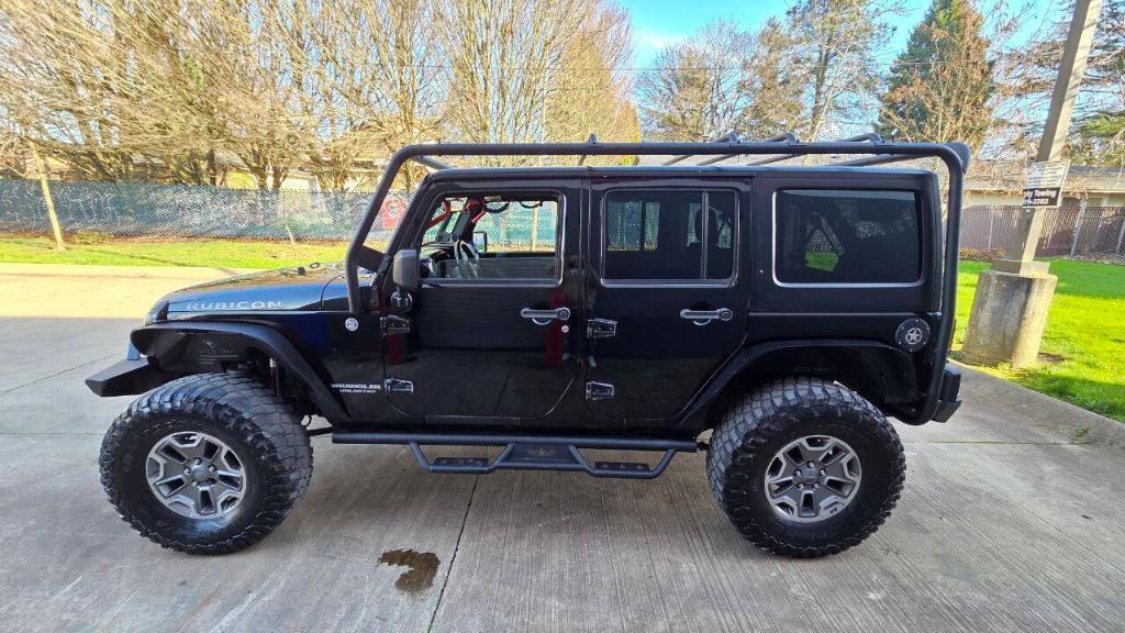 used 2014 Jeep Wrangler Unlimited car, priced at $16,495