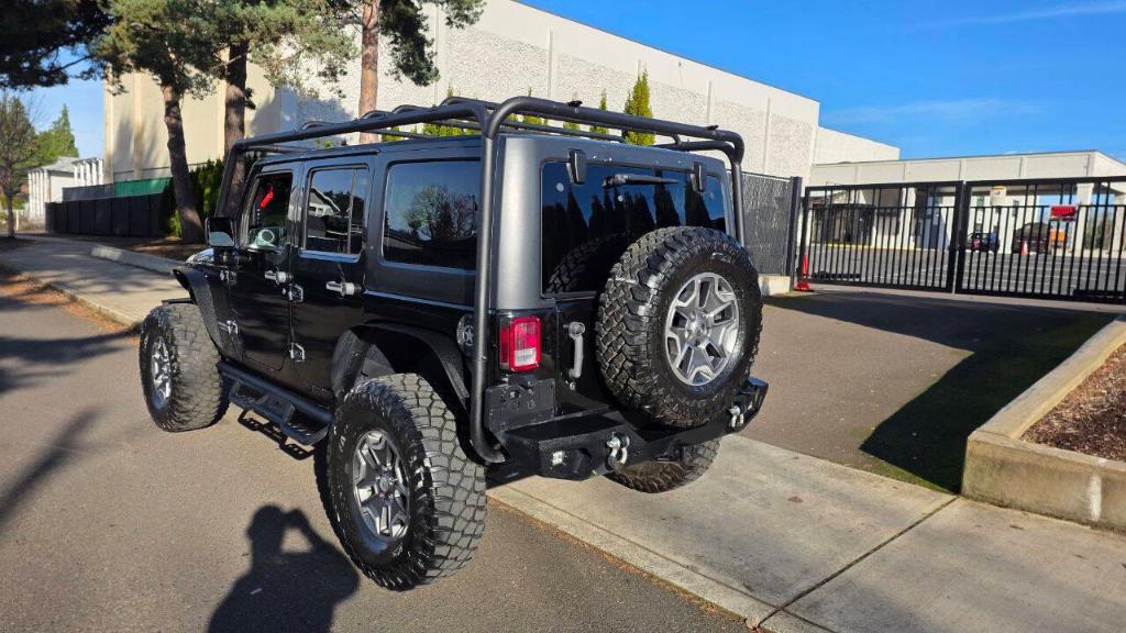 used 2014 Jeep Wrangler Unlimited car, priced at $14,995