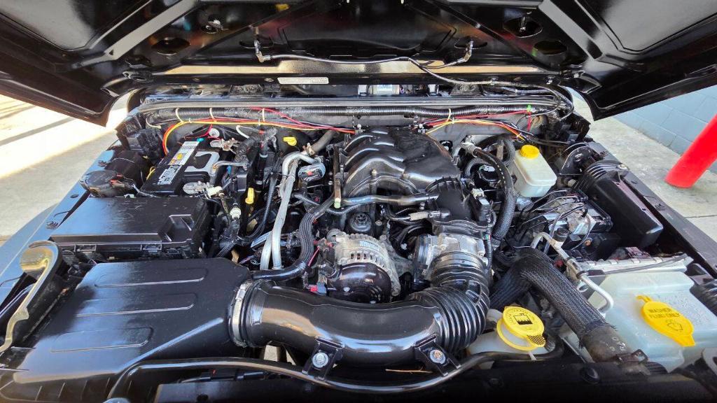 used 2014 Jeep Wrangler Unlimited car, priced at $16,495