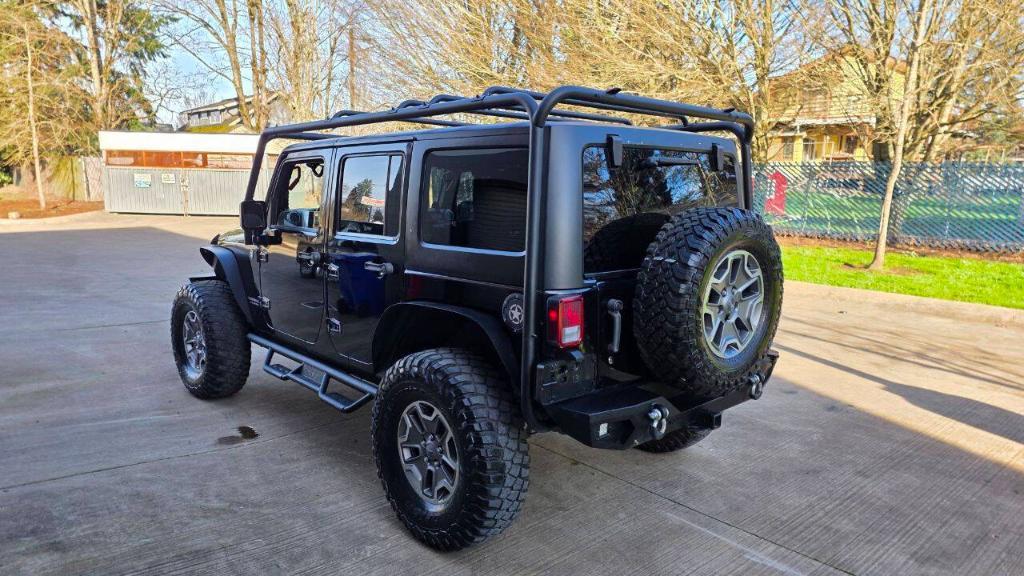 used 2014 Jeep Wrangler Unlimited car, priced at $16,495