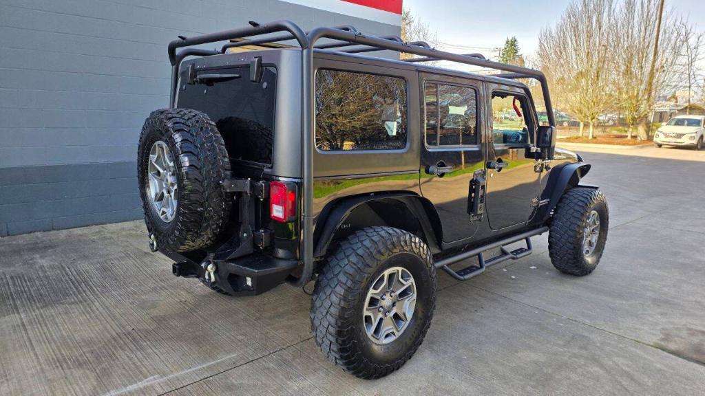 used 2014 Jeep Wrangler Unlimited car, priced at $16,495
