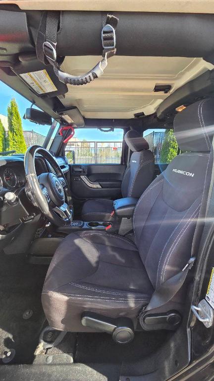 used 2014 Jeep Wrangler Unlimited car, priced at $16,495