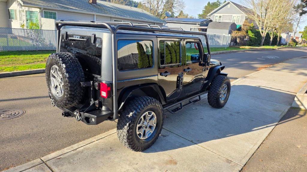 used 2014 Jeep Wrangler Unlimited car, priced at $14,995